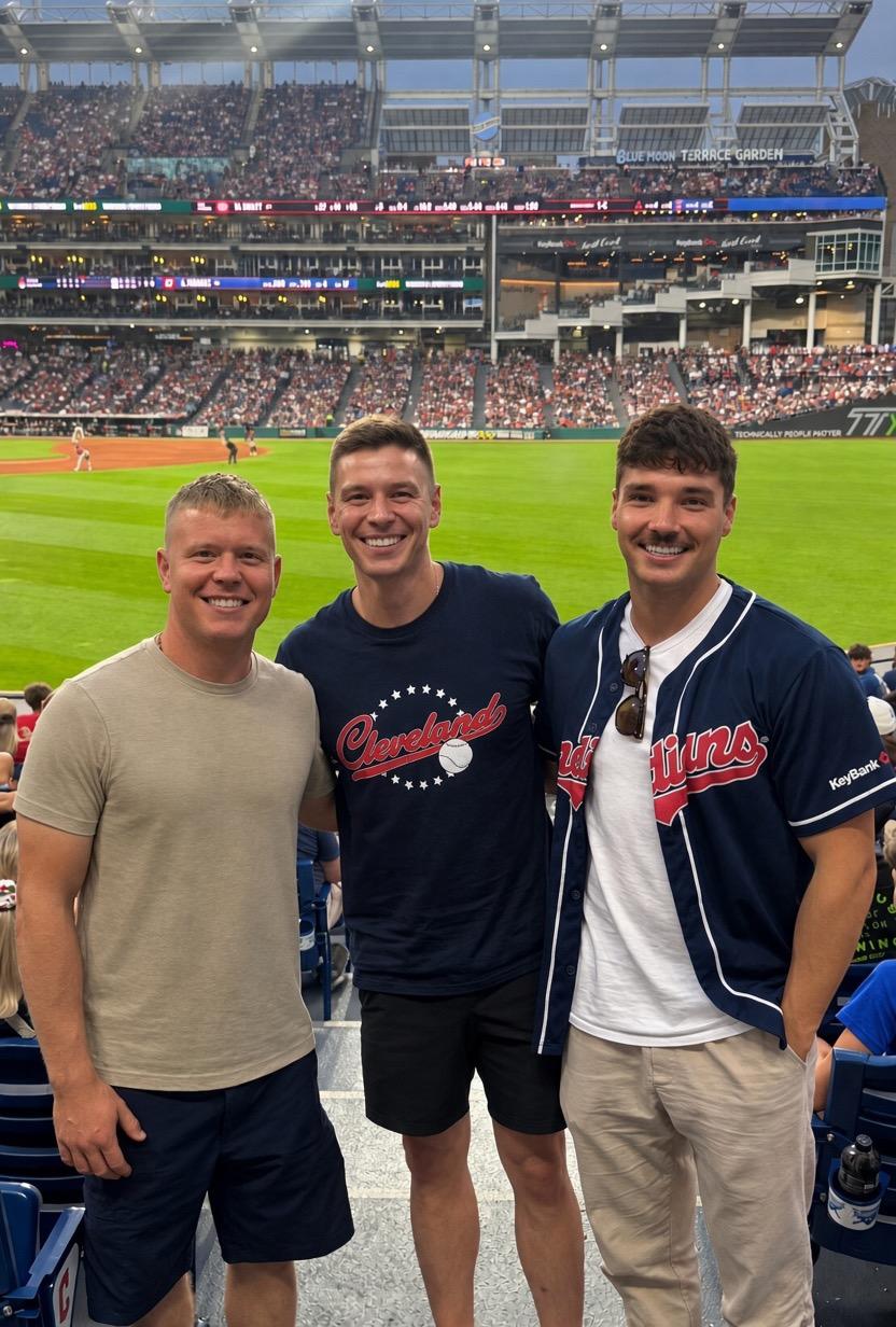 Drew, Brian, and Ian of CDR Property Group at a Cleveland Guardians game